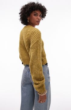 Fuzzy texture is punctuated with cables in a cropped cardigan designed with a slouchy fit. 18" length (size Medium) Front button closure Crewneck Long sleeves Dropped shoulders Ribbed cuffs and hem 47% polyester, 37% nylon, 11% acrylic, 5% wool, Machine wash, dry flat Imported Cropped Textured Knit Sweater For Layering, Winter Cropped Pointelle Knit Cardigan, Cropped Pointelle Knit Cardigan For Winter, Cropped Pointelle Knit Cardigan For Fall, Fall Cropped Open Knit Cardigan, Cropped Open Knit Winter Cardigan, Fall Open Knit Cropped Sweater, Cropped Open Knit Cardigan For Fall, Cropped Open Knit Cardigan