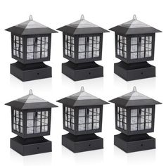 six black lanterns with one light on each side and the other in different positions, all lit up