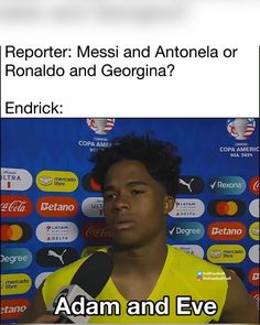 a man holding a microphone in front of a wall with words on it that read, reporter messi and antonio or ronald and georgia?