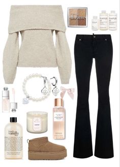 the contents of a woman's outfit including boots, sweater and bracelet