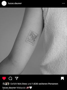 a woman's arm with a stamp on it and the words i love you