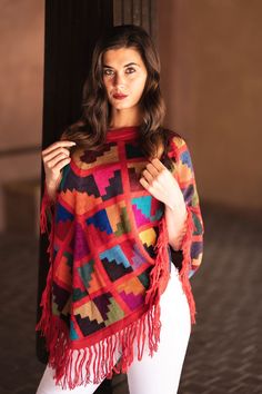 Visit us on my website: https://ziasbeauties.com/fr/accessoires-en-alpaga/ Peruvian poncho, Poncho and coat hand-woven in Peru, in Baby-alpaca wool. Using traditional methods, 100% natural fabrics. Made with patterns from the Inca calendar and materials specially chosen to give you chic and elegant tones, to cover you warmly with the softness of Baby-Alpaca ideal for the cold of winter. Buying a Zia's Beauties product means acquiring an elegant and refined piece while respecting the environment Handmade Alpaca Bohemian Poncho, Handmade Bohemian Alpaca Poncho, Bohemian Alpaca Shawl, Bohemian Alpaca Shawl Cape, Multicolor Handwoven Folk Poncho, Artisan Handwoven Multicolor Poncho, One Size Multicolor Alpaca Shawl, Multicolor Alpaca Shawl, Multicolor Alpaca Shawl Poncho