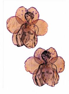 two pink and brown flower shaped brooches with female figures on the petals, set against a white background