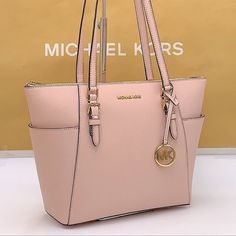 Shop Women's Michael Kors Pink Gold Size LG Totes at a discounted price at Poshmark. Description: MICHAEL KORS CHARLOTTE LARGE TOP ZIP POWDER BLUSH NWT MICHAEL KORS CHARLOTTE LARGE TOP ZIP POWDER BLUSH •Powder Blush • Tote bag •l100% leather • Gold-tone hardware • 15”W X 10”H X 4.75”D • Handle drop: 10” • Exterior details: 2 side slip pockets • Interior details: back zip pocket, 2 front slip pockets • Lining: 100% polyester • Zip fastening • Imported. Sold by good_store. Fast delivery, full ser Classic Pink Michael Kors Bag, Classic Pink Michael Kors Shoulder Bag, Blush Powder, Mk Purse, Flap Backpack, Tan Bag, Carryall Tote, Exterior Details, Small Tote Bag