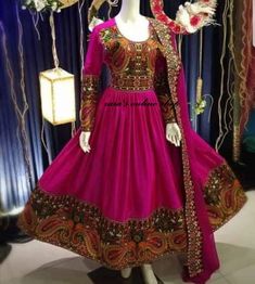 afghan kuchi traditional wedding drees is made of good quality long lasting fabric. Traditionally such Afghanistan Persian Pashtun new design frocks are used as bridal dress. Most of girls also like and recommend such dresses for wedding, Nikkah and Mehndi night events. The dress measurements are kept average. If you need this frock in exact measurements you need, then please send us measurements which best fit on your body Pink Dresses With Resham Embroidery For Traditional Ceremonies, Traditional Dabka Maxi Dress For Wedding, Bohemian Semi-stitched Dresses With Dabka Work, Pink Anarkali Dress For Traditional Ceremonies, Maxi Dress With Dabka Work For Traditional Ceremonies, Anarkali Gown With Mirror Work For Traditional Ceremonies, Traditional Pink Dress With Dabka Work, Anarkali Long Dress With Dabka, Maxi Length Dresses With Dabka Work For Traditional Ceremonies