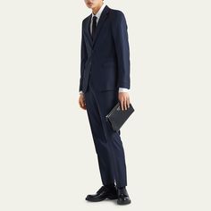 Prada two-piece solid suit Notched lapels; two-button front Chest welt pocket Hip flap pockets Four-button sleeve finish Flat-front trousers Virgin wool/cupro/viscose Made in Italy Prada Suit, Man Suit, Prada Men, Flap Pocket, Welt Pocket, Mens Suits, Wool Blend, Prada, Tops Designs