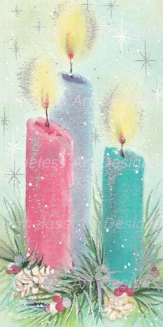 three lit candles sitting next to each other in front of snowflakes and pine cones