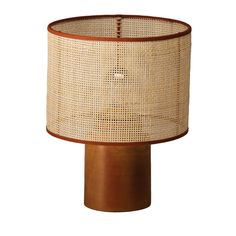 a lamp that is made out of wicker and wood with a brown shade on top