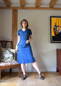 A beautiful vintage Laura Ashley denim dress V neck, constructed from slim panels. Raised waistline.  Made in Macau. 100% cotton In very good vintage condition. Marked as a UK 10 / EU 36 / US 6 Chest 35"/ 90cm Waist: 31"/ 78cm Hips: 37"/ 94cm Length: 42.5"/ 108cm Fitted Vintage Midi Denim Dress, Fitted Vintage Midi Length Denim Dress, Fitted Vintage Denim Dress, Fitted Blue Vintage Denim Dress, Vintage Fitted Denim Dress, Fitted Vintage Blue Denim Dress, Vintage Denim Blue Knee-length Dress, Vintage Knee-length Denim Blue Dress, Vintage Fitted Medium Wash Dresses