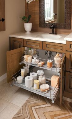 a bathroom sink with two shelves holding toiletries and soaps