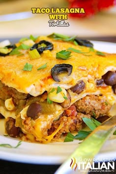 the mexican lasagna is loaded with meat and vegetables