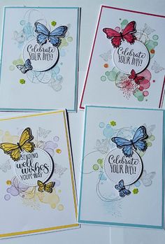 four greeting cards with butterflies on them