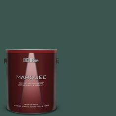 behr marquee interior paint in one gallon, with the light shining on it