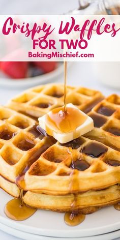 a plate with waffles and syrup on it that says crispy waffles for two