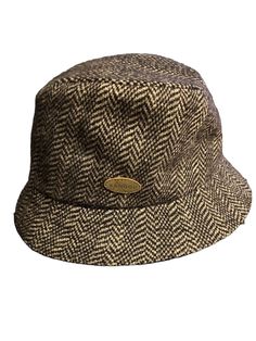 KANGOL Heritage Collection Small Wool Herringbone Gaffer Trilby Plaid Hat 6843KG. Classic Hat With Herringbone Pattern And Curved Brim, Classic Hat With Curved Brim And Herringbone Pattern, Classic Curved Brim Hat With Herringbone Pattern, Classic Herringbone Pattern Hat For Outdoor, Classic Outdoor Hat With Herringbone Pattern, Classic Brown Bucket Hat With Short Brim, Classic Brown Bucket Hat, Outdoor Hats With Herringbone Pattern And Short Brim, Outdoor Herringbone Pattern Hat With Short Brim