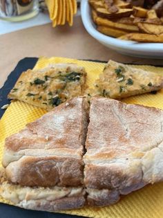 some food is laying out on a yellow towel