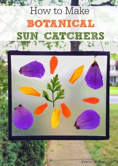 an art project made out of stained glass with flowers and leaves on the window sill