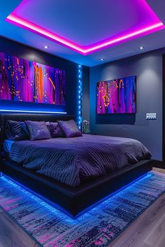 a large bed sitting under a purple light in a bedroom