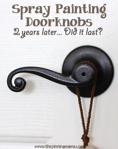 an advertisement for spray painting door knobs, which is attached to a door handle