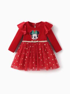 Celebrate the holidays in style with this Officially Licensed Disney Dress!
* Product features: Christmas-themed Disney character print
* Fabric characteristics: Soft velvet and polka dot mesh fabric
* Piece of product: One-piece dress
* Neckline: Flouncy ruffled sleeves 
* Sleeves: Elegant off-shoulder design 
* Style: A-line silhouette with a gold mesh polka dot skirt and a golden ribbon at the waist 
* Fit: Comfortable and true to size 
* Length: Knee-length Christmas Minnie Mouse, Mesh Dresses, Golden Ribbon, Disney Dress, Disney Dresses, Disney Character, Polka Dot Skirt, Dot Skirt, Necklines For Dresses