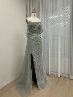 a dress on display in front of a window