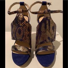 Amazing! Rare Brand New! Bebe Stiletto Cobalt/Navy Blue An Gold Snakeskin Shimmery Print! 6 Inch Heel Ankle Strap Sandals. Size 7 Smoke-Free Home No Pets Not Returnable Blue Wedge Heel Sandals For Evening, Blue Wedge Heels For Evening, Chic Blue Sandals For Night Out, Royal Blue Open Toe Heels For Party, Blue Leather Heels For Night Out, Chic Royal Blue High Heels, Snake Heels, 6 Inch Heels, Ankle Strap Sandals