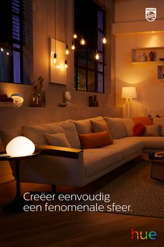 a living room filled with furniture and lights