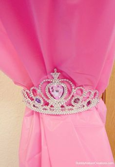 a pink dress with a tiara on it