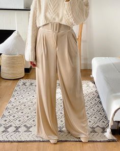 Our soft, high-waisted Velvet Tailored Wide Leg Pants are an effortlessly chic style in a beautiful shade. We are obsessed with this flattering wide leg style that comfortable fits at the waist with an elastic back and flat front waistband. It features a matching adjustable and detachable belt to cinch in the waist, front zip closure and metal hook and side pockets. Velvet luxe, we recommend pairing these with our Silky Blouse Reverie and a tan ankle boot for a sophisticated look or with our Tur Velvet Pants Outfit Fall, Velvet Pants Outfit, Tan Trousers, Comfortable Fits, Tan Ankle Boots, Professional Office, Velvet Trousers, Neutral Style, Statement Bag