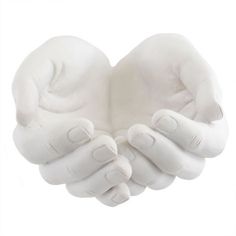 two hands that are holding each other in the shape of a heart on a white background