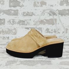 New Toe Shape Round Toe Closure Slip On Us Shoe Size 5 Occasion Casual, Workwear Platform Height .75 In Heel Height Mid (2-2.9 In) Department Women Outsole Material Rubber Style Mule Features Comfort, Cushioned Season Fall, Spring, Summer, Winter Pattern Solid Lining Material Suede Color Beige, Black Brand Eileen Fisher Type Heel Heel Style Block Model Eileen Fisher Hiya Shoe Width Standard Upper Material Suede Insole Material Leather Casual Beige Clogs With Leather Sole, Spring Mules With Rubber Sole And Medium Width, Beige Suede Clogs With Round Toe, Spring Suede Clogs With Cushioned Footbed, Beige Suede Closed Toe Clogs, Spring Beige Suede Clogs, Beige Slip-on Mules With Stacked Heel, Beige Platform Slip-on Mules, Spring Mules With Rubber Wedge Heel