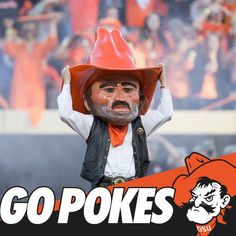 a statue of a man wearing a cowboy hat with the words go pokes on it