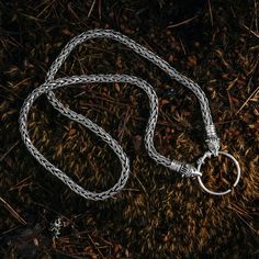 FREE SHIPPING Vikings used necklaces with animals or beasts biting onto a ring where pendants were hung. This Sterling Silver variant is truly a majestic piece, ending bear heads based on the unique find in Eketorp, Sweden in 2017. The chain, the split ring and the bear heads are 100% handmade from solid Sterling Silver 925, which results in a piece of fantastic jewelry. The split ring is simple to open and close, which allows for different pendants to be hung from it, and for the chain to be re Handmade Viking Style Round Necklaces, Handmade Viking Jewelry With Round Pendant, Handmade Viking Style Round Pendant Jewelry, Viking Style Sterling Silver Round Pendant Jewelry, Handmade Viking Style Necklaces, Handmade Viking Round Necklaces, Viking Style Metal Round Pendant Jewelry, Viking Style Sterling Silver Pendant Jewelry, Handmade Viking Round Necklace