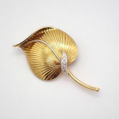 "Vintage Italian 18 K (.750) yellow & white gold brooch in form of a leaf, accented with Diamonds. Made by Garavelli Aldo & C., Viale Dante, 24, Valenza. This splendid brooch is 2\" long, 1 1/8\" wide and weighs 6.9 grams. EA2741" Luxury Yellow Gold Luxury Brooches, Elegant Leaf-shaped Brooches For Gifts, Gold Brooch, Leaf Brooch, Gold Brooches, Vintage Italian, Vintage Watches, Antique Jewelry, Yellow White