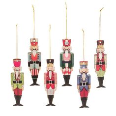 an assortment of nutcrackers hanging from strings