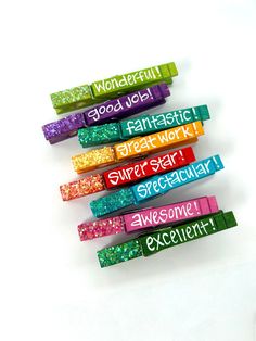 five colorful pencils with writing on them that say,'wonderful good job fantastic great work super star spectacular awesome excellent