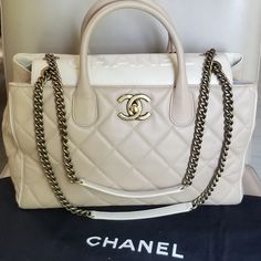 Beautiful Authentic Chanel Portobello Quilted Lambskin Logo Large Chain Strap Cc Turnlock Tote Handbag Great Looking Purse, Always Bound To Be A Stunning , Elegant And Fun Classic, Goes With Almost Every Outfit. Makes An Awesome Everyday Bag, Great For Work Or Play, Go From Business Pro To Light Fun Bag For A Night Out. Great Pre-Owned Condition. I Will Give It An 8/10 Condition Wise. Overall, Still Really Nice Looking Handbag Condition: ** Some Loss Of Shape When Empty From Storing It ** Minor Designer Tote Shoulder Bag With Cc Turnlock Closure, Designer Shoulder Bag With Cc Turnlock For Shopping, Luxury Beige Bags With Branded Hardware, Shopping Tote Shoulder Bag With Cc Turnlock Closure, Classic White Bag With Cc Turnlock Closure, Elegant Tote Shoulder Bag With Cc Turnlock Closure, White Office Bags With Chain Strap, White Chain Strap Bag For Office, Classic Cream Bags With Cc Turnlock Closure