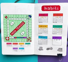 an open notebook with the word habitts on it next to a drawing of a soccer field