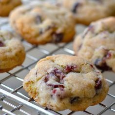 freshly baked cranberry and white chocolate chip cookies cooling on a wire rack, ready to be eaten