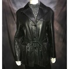 Here is a beautiful and soft Italian lamb skin genuine leather jacket from Dimension New York. Women’s size large. It had a zip-out fleece liner vest that I no longer have. Jacket is 100% genuine leather with 50% nylon/50% acetate lining. Belt that ties in front, belt loops, 2 front pockets with flaps, 3-button closure in front, collar. In very good condition. Casual Black Leather Long Coat, Casual Black Leather Blazer, Casual Long Leather Jacket For Spring, Casual Leather Long Coat For Fall, Casual Long Leather Coat, Belted Jacket, Black Leather Belt, Genuine Leather Jackets, Leather Belt