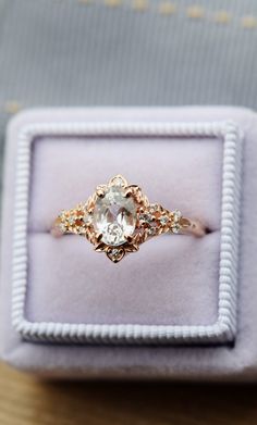 an engagement ring in a velvet box