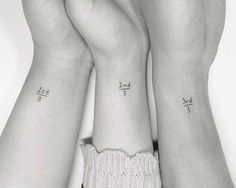 two people with matching tattoos on their arms