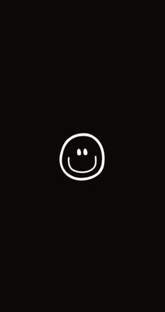 a smiley face on a black background