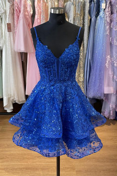 This dress features a V neck and spaghetti straps, with lace appliques and ruffle details on its A-line silhouette. It is made from royal blue tulle material and has a zip-up back, falling at an above knee length. SKU: 3550 Royal blue color Tulle material A-line silhouette Spaghetti straps V neck Lace appliques Ruffles skirt Above knee length Zip-up back Ship in 7-10 business days Size: US 2-16. We offer free returns in 7 days. Please refer to our return policy page for more details. If you have Quince Small Dress, Royal Blue Corset Dress Short, Hoco Dresses With Corset, Rio Hoco Dresses, Short Blue Homecoming Dresses, Royal Blue Hoco Dress Flowy, Royal Blue Dress Homecoming, Under The Sea Homecoming Dresses, Homecoming Blue Dresses