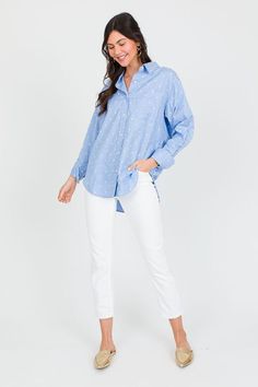 Don't miss the texture on this shirt! The solid blue is topped with an embroidered white polka dot texture. Classic button down style with an oversized shape and a tunic length that dips longer in the back. Relaxed Fit Cotton Blouse With Polka Dot, Relaxed Fit Cotton Blouse In Polka Dot, Polka Dot Cotton Blouse With Relaxed Fit, Cotton Polka Dot Blouse With Relaxed Fit, Casual Cotton Swiss Dot Blouse, Long Sleeve Polka Dot Top With Relaxed Fit, Polka Dot Long Sleeve Top With Relaxed Fit, Casual Swiss Dot Blouse For Work, Casual Long Sleeve Swiss Dot Blouse