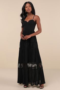 The compliments will never end once you make your entrance in the Lulus Stunning RSVP Black Pleated Lace Sleeveless Bustier Maxi Dress! Airy woven chiffon shapes this memorable dress that falls from adjustable spaghetti straps into a sweetheart neckline and a bustier-style bodice with supportive boning. High, fitted waist tops an accordion-pleated, A-line skirt that boasts ruffled, sheer lace panels as it falls to an elegant maxi hem. Hidden back zipper/clasp. Fit: This garment fits true to size Chiffon Spaghetti Strap Maxi Dress For Night Out, Chiffon Maxi Dress With Spaghetti Straps For Night Out, Black Summer Maxi Dress With Corset Back, Black Spaghetti Strap Dress With Pleated Bodice, Black Dress With Pleated Bodice And Spaghetti Straps, Black Sleeveless Maxi Dress With Corset Back, Black Maxi Dress With Sweetheart Neckline And Lined Bodice, Black Strapless Chiffon Dress, Pleated Bustier