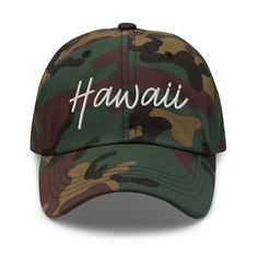 DISCLAIMER: Hevvy Headwear is not affiliated or associated with any other organizations, including but not limited to professional sports organizations and academic institutions. HEVVY IS THE CROWN YOUR HAT, YOUR WAY 100% chino cotton twill Green Camo color is 35% chino cotton twill, 65% polyester Unstructured, 6-panel, low-profile 6 embroidered eyelets Adjustable strap with antique buckle Hawaii Hat Hawaii Dad Hat Hawaii Retro Script Hat Hawaii Retro Script Dad Hat Outdoor Letter Print Bucket Hat, Hip Hop Hat With Letter Print For Outdoor, Green Flat Bill Hat With Letter Print, Letter Print Visor Hat For Streetwear, Streetwear Visor Hat With Letter Print, Casual Flat Bill Hat For Sports Events, Curved Brim Hats With Letter Print For Baseball Season, Curved Brim Dad Hat With Letter Print For Sports, Outdoor Dad Hat With Letter Print And Curved Bill