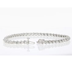 Ships within 1 dayPretty, elegant this 3 cttw diamond bracelet in 10k white gold illuminates her wrist like no other. The dazzling 50 natural round diamonds are I-J color and SI2-I1 clarity and set in a prong setting. The bracelet is secured by a box and tongue safety clasp. A gift box is included with this 7 inch bracelet.Stone Type - Natural DiamondMetal - 10K White GoldDiamond Carat Weight - 3 cttwNumber of Diamonds - 50Diamond Clarity - SI2-I1Diamond Color - I-JClasp Type - Box with Tongue and SafetySetting - Prong SettingDiamond Shape - RoundBracelet Length - 7 InchesBirthstone Month - AprilVir Jewels 10K White Gold Bracelet For Female Adult Dazzling White Diamond Bracelet With Single Cut Diamonds, White Diamond Bracelet With Accents, White Diamond Tennis Bracelet With Diamond Accents, Fine Jewelry White Diamond Bracelet With Prong Setting, Dazzling White Diamond Bracelet For Anniversary, White Gold Diamond Bracelet With Prong Setting, White Diamond Bracelet With Prong Setting, White Diamond Bracelet With Single Cut Diamonds, Brilliant Cut White Diamond Bracelet For Anniversary