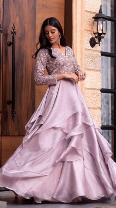 “Inara” our handcrafted layered gown in the ethereal palette of lilac - a palette inspired by celestial beauty .  The outfit features self sequins, cutdana and zardosi work in the form of geometric design along with layered imported net gown.  #receptionoutfit #engagementoutfit  To book an appointment :  contact us at +91 9321309227  For further queries, please DM ! Ethereal Palette, Net Gown, Layered Gown, Net Gowns, Party Gown Dress, Reception Outfit, Zardosi Work, Diy Hair Accessories Ribbon, Dress Lilac