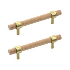 two wooden handles with brass hardware on white background